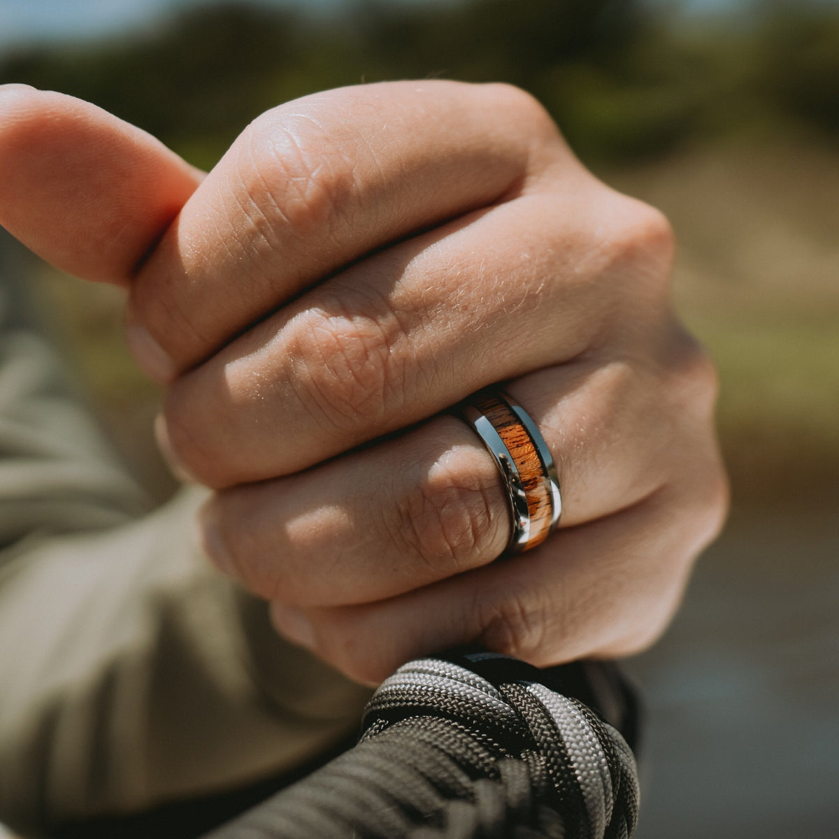 Mens Classic Wooden Wedding Ring On The Hand